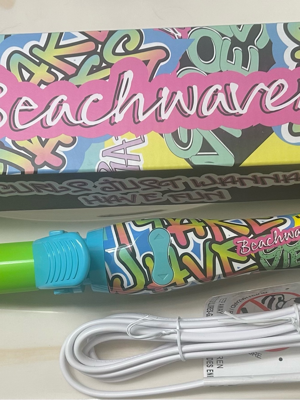 The Beachwaver Co. Multicolor Graffiti Pattern Curling Iron with Green Tip